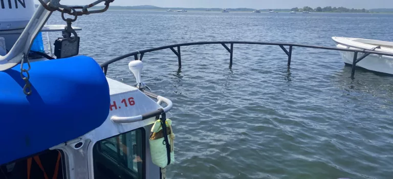 Ipswich Marine Patrol Unit Safely Removes Floating Navigational Hazard from Plum Island Sound Waters